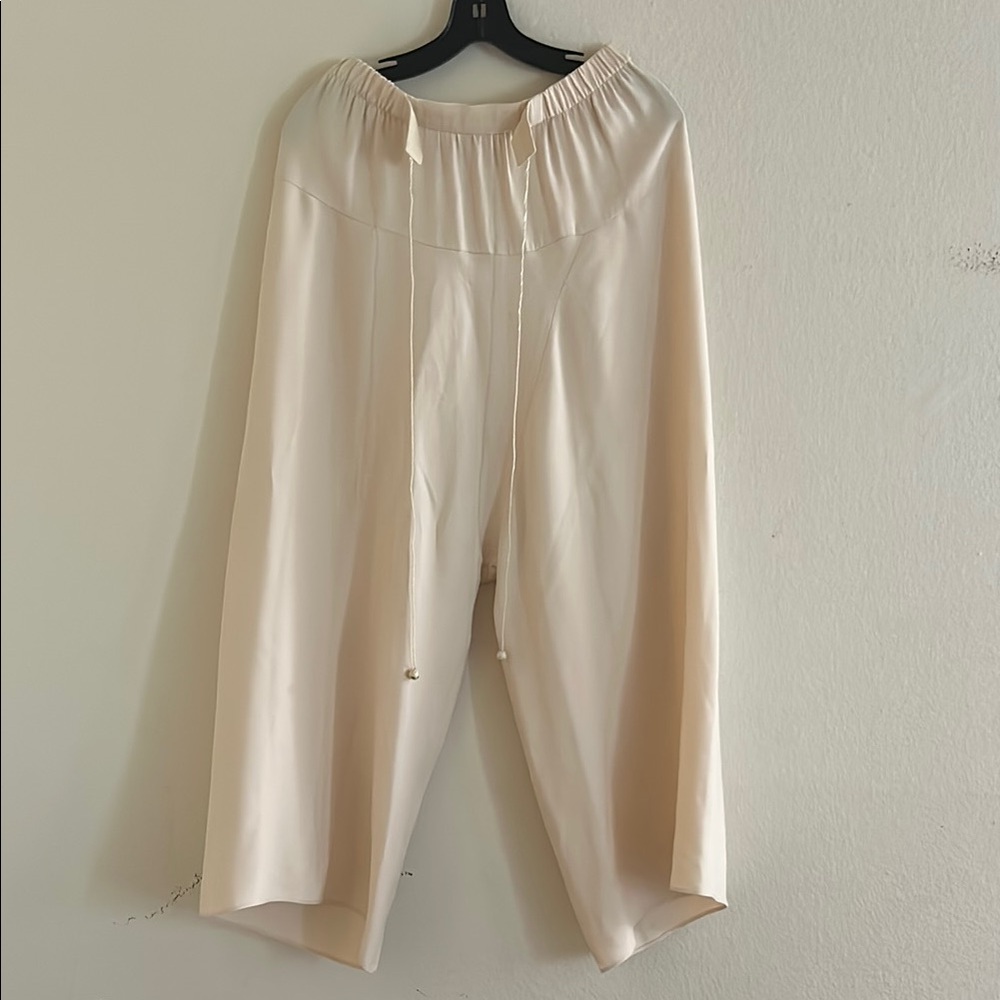 The Row Cream pants with Relaxed Silhouette